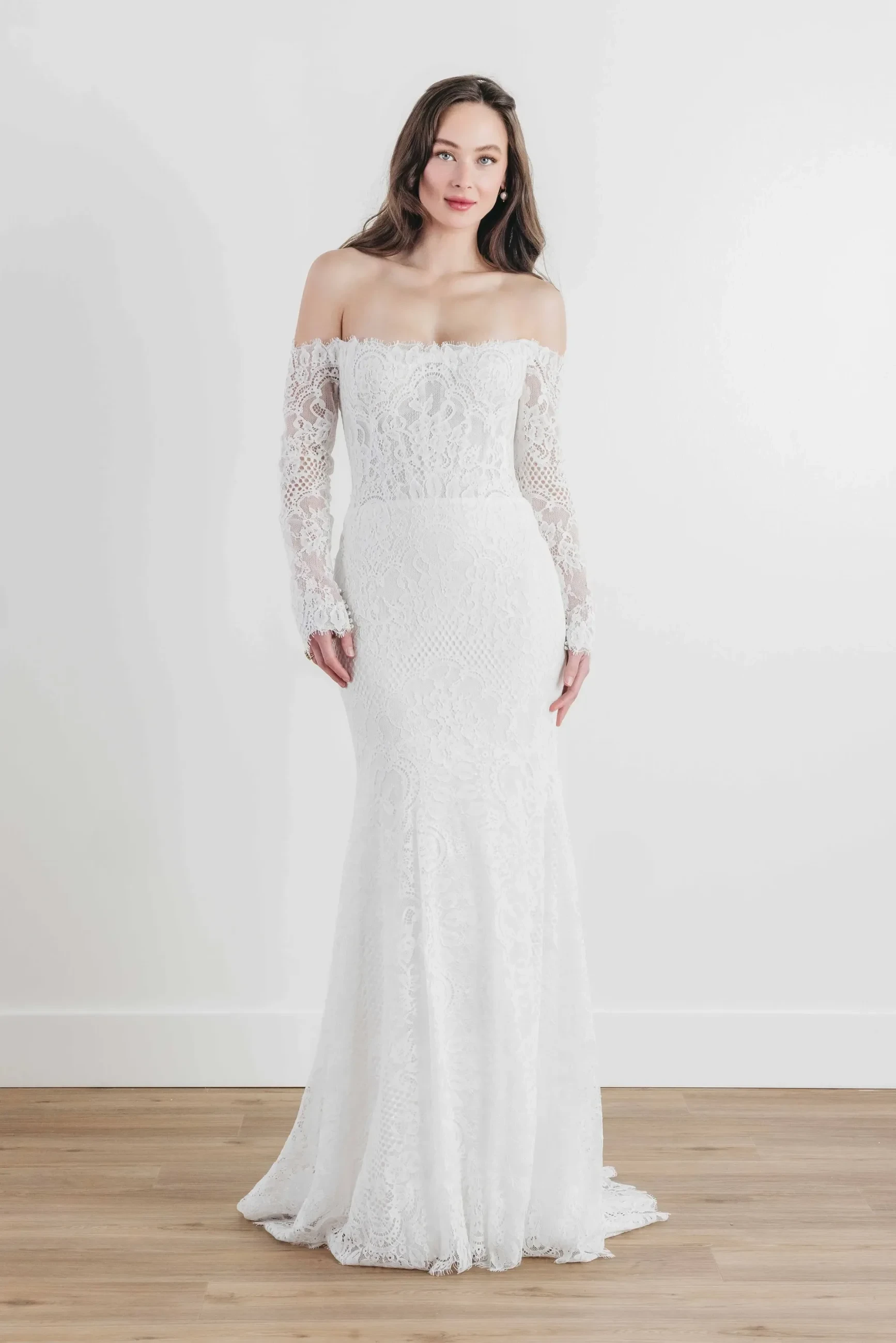 Model displaying a white wedding dress by Wtoo by Watters