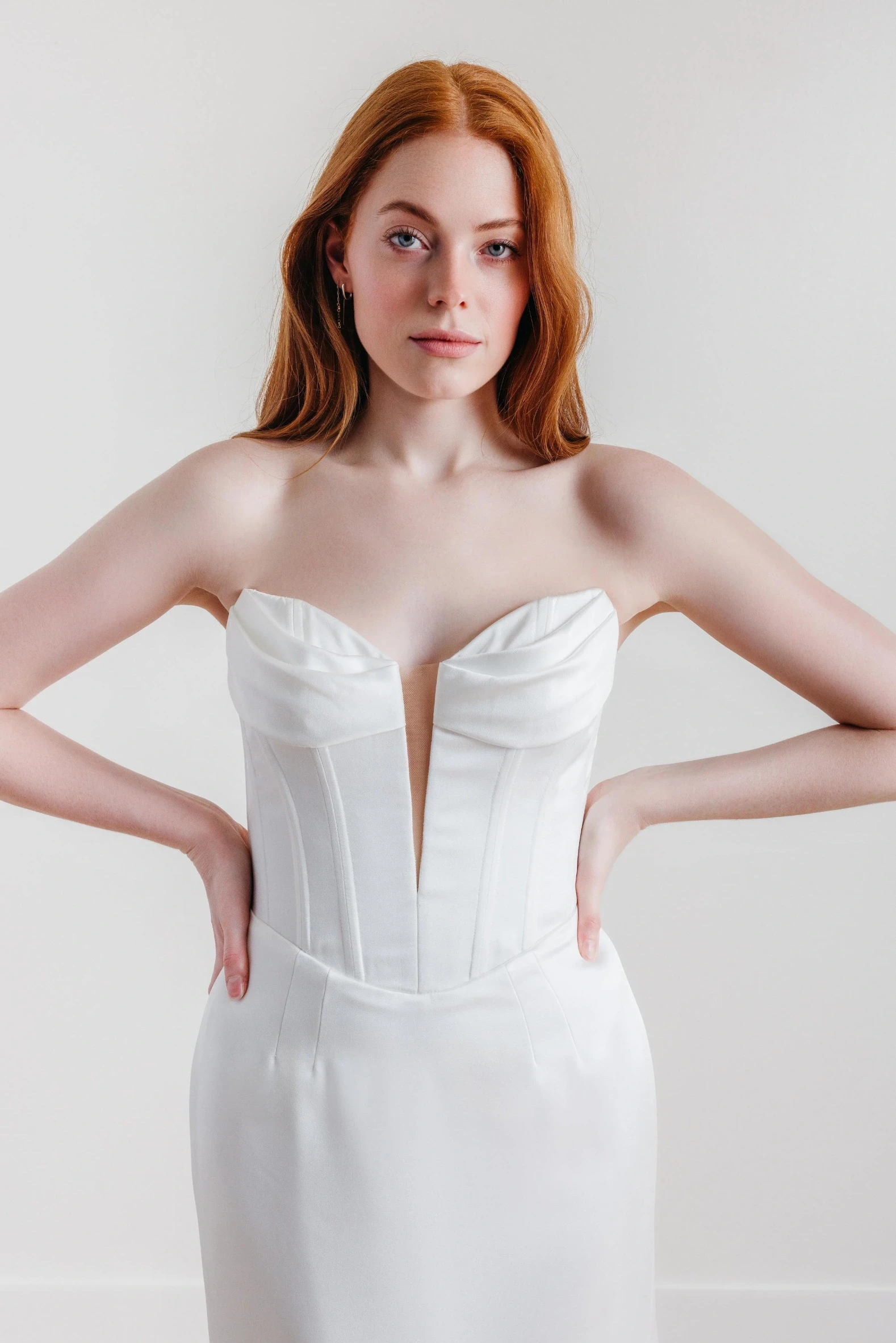 Model wearing a wedding dress by Wtoo by Watters