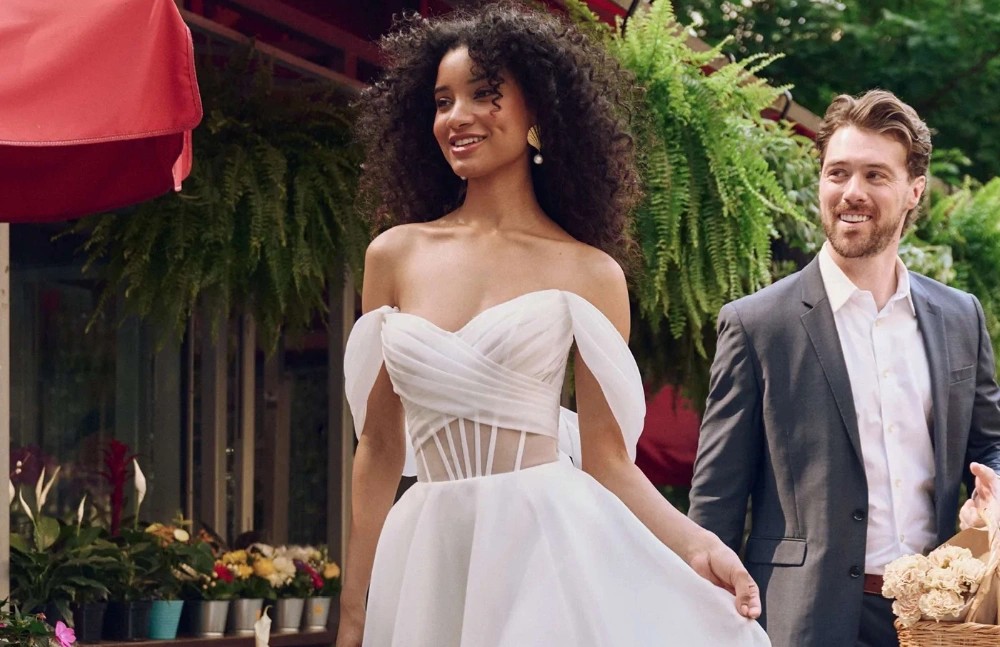 Model wearing white bridal gown