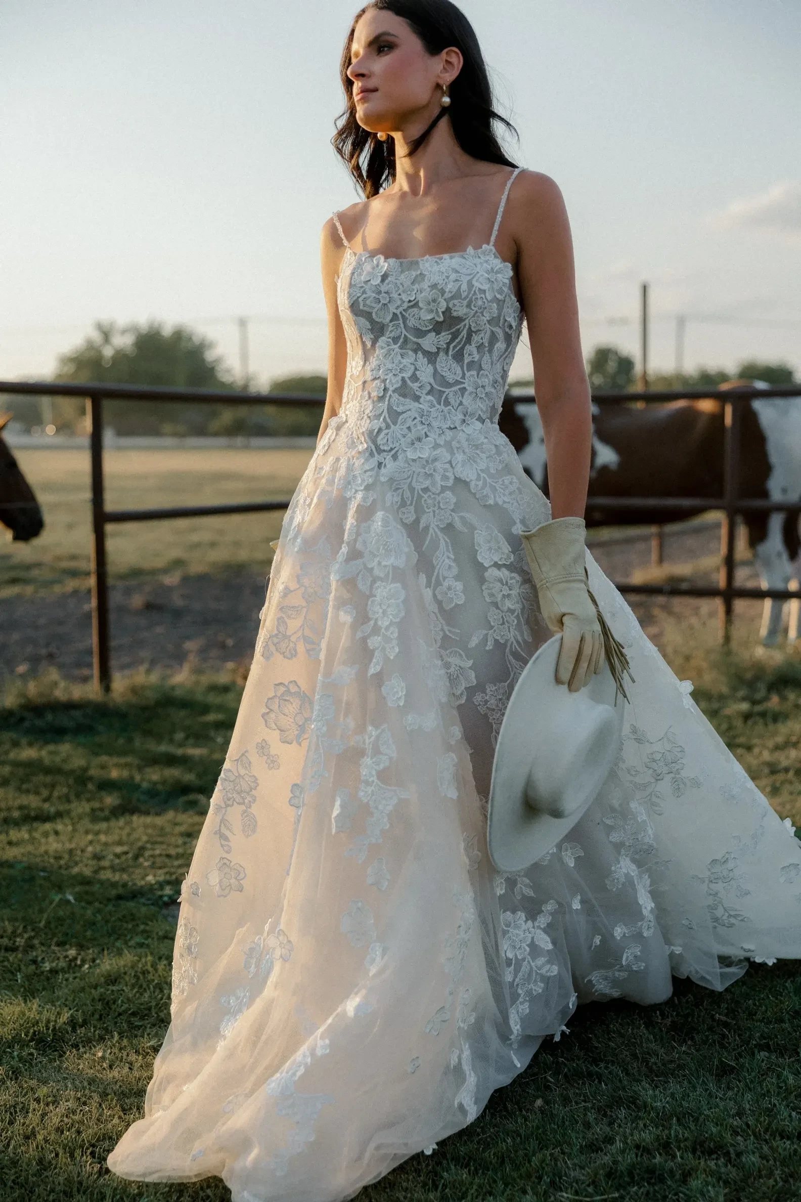 Model wearing a wedding dress by Wtoo by Watters