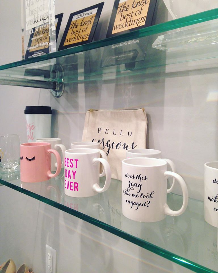 Shelves filled with coffee mugs and awards