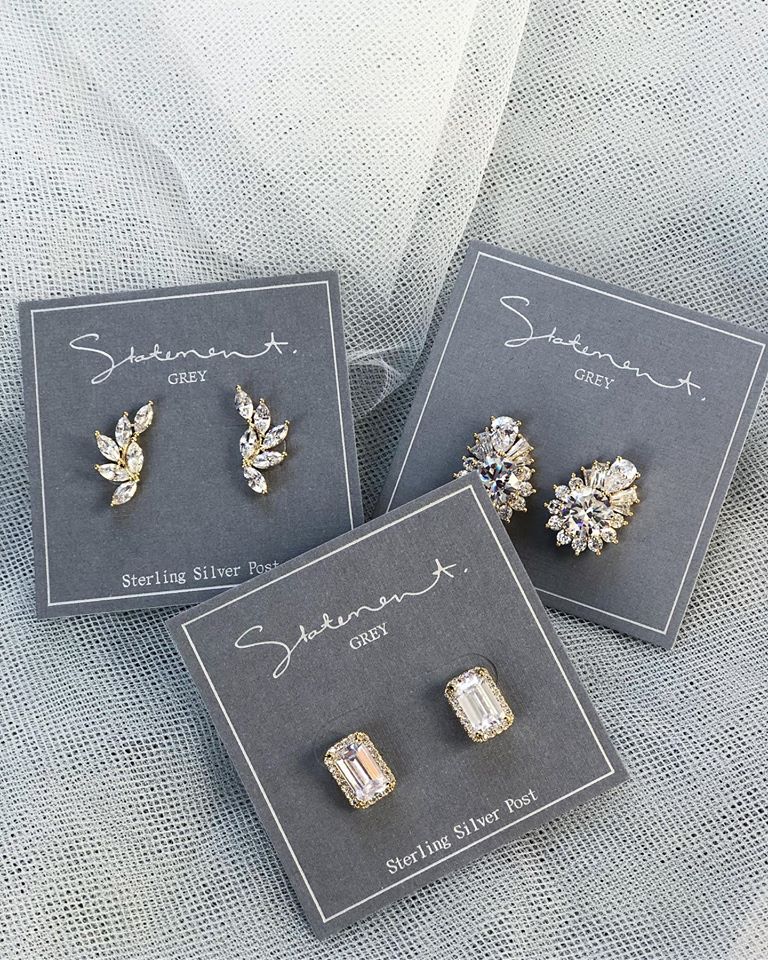 Three pairs of  sterling silver stud earrings